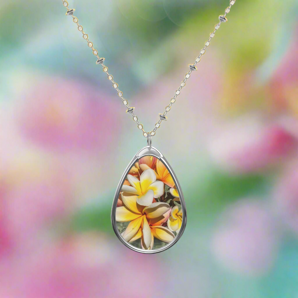 Floating_Frangipanis_New_Oval_Pendant_Necklace_FWS_pastel background